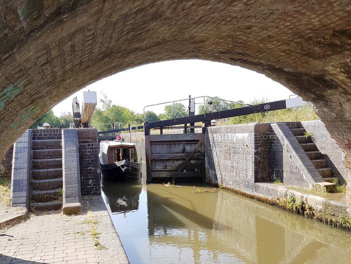 Boutique Narrowboat exiting a lock on the Grand Union Canal Leicester Line